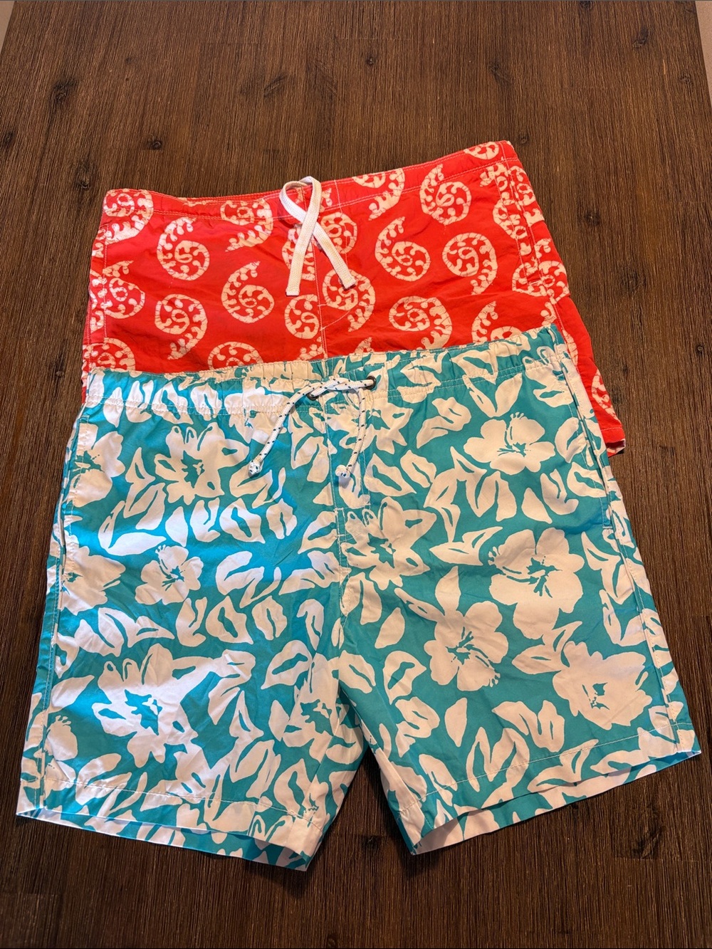 JOE FRESH Turquoise & White Floral Swim Trunks + Coral Patterned Swim Shorts
